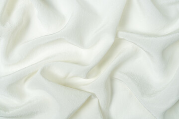 Obraz premium Premium quality white natural silk fabric with waves and folds. Beautiful elegant silk background, top view.