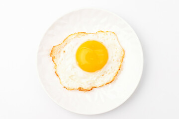Fried eggs on white background