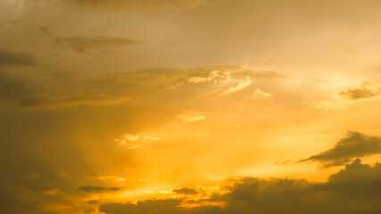 Fototapeta na wymiar Yellow sky sunset with some clouds