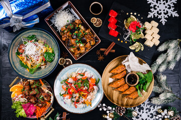 Concept Chinese new year table set up and Chinese dishes. table with dishes for celebrating the Asian New Year
