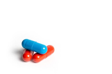 Macro of medicine capsules on white background