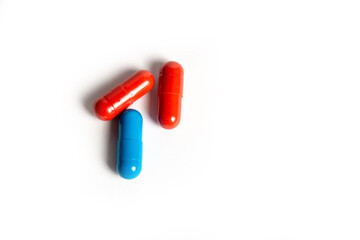 Macro of medicine capsules on white background