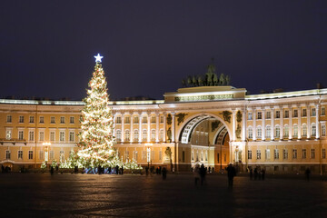 Fototapeta na wymiar New year and christmas decoration with tall and beautiful fir tree on the Palace square of Saint Petersburg in Russia