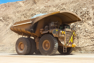 Huge dump truck in a copper mine.