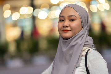 Young teenager waiting vehicle at stop station.