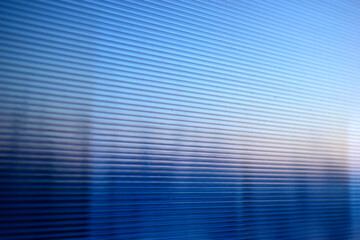 Blue striped polycarbonate surface with reflection