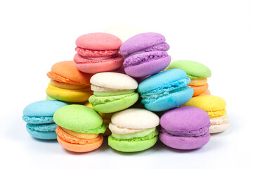 Fototapeta na wymiar Pile of colorful macaroons is a french sweet delicacy isolated on white background.