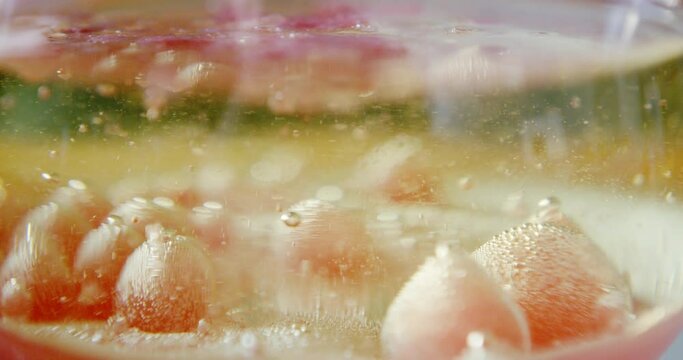 Fantastic structure of golden bubbles. Scientific experiment, chemical reactions. Chaotic motion, bubble flow expansion, curlicue of paints. Psychedelic liquid light show, ink patterns in water oil