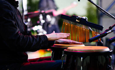 Musician play on percussion (drum)