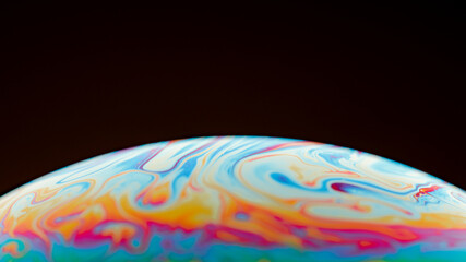 Half of a soap bubble, an abstract semicircle background. The model of the cosmos or the planets