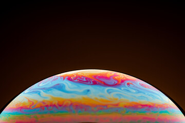 Half of a soap bubble, an abstract semicircle background. The model of the cosmos or the planets