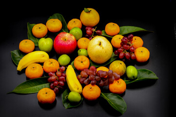 fruits on black background