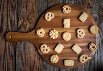 Butter biscuits on wooden board