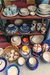 Multicolored traditional bowls and dishes on the market in Ho Chi Minh city, Vietnam.