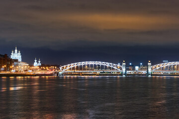 Fototapeta na wymiar Russia, Petersburg, Night view of the Bolsheokhtinsky bridge across Neva river
