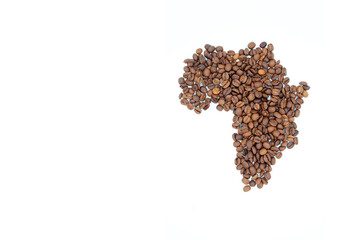 Roasted coffee beans in the shape of continent africa on a white background