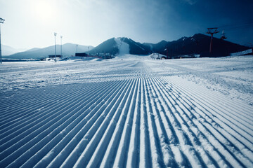 Ski slopes on mountains ski resort in winter