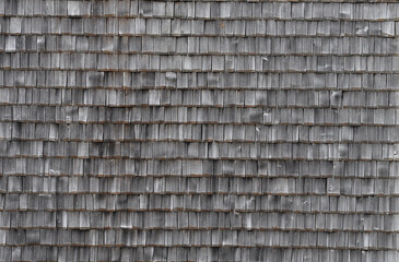 Wand mit alten Holzschindeln als Hintergrund