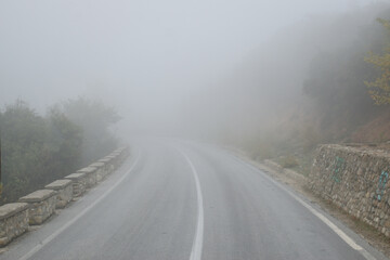 Foggy road in the Meteora region of Greece
