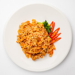 rice pilaf with meat, carrot and onion isolated on white background