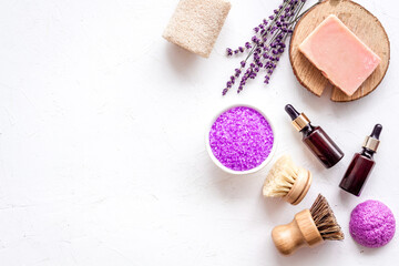 Fototapeta na wymiar Set of lavender cosmetics products with spa beauty essential oil and herbs