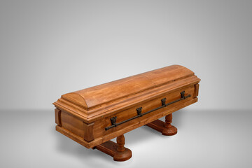 luxury wood coffin on a grey set