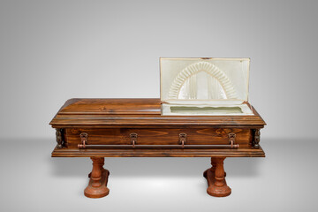 luxury wood coffin on a grey set