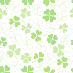 Vector seamless clover pattern. Clover pattern for Saint Patrick's Day. Clover pattern with three and four-leaf. Chaotic shamrocks pattern.