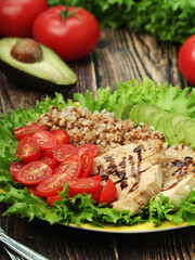 Turkey breast, avocado, salad and buckwheat as healthy lunch
