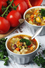 Bowls with Italian soup minestrone	
