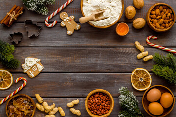 Frame of Chtistmas cooking - icing gingerbread cookies, top view
