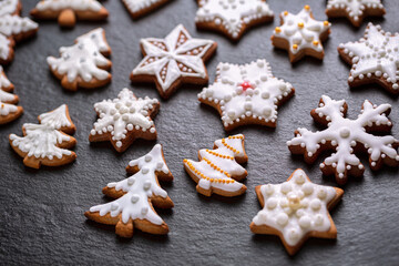 Fototapeta na wymiar Homemade christmas cookies on slate table