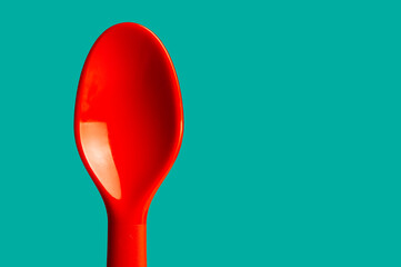 Red spoon for children, utensil use for picnic.