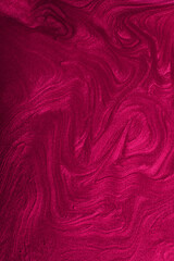 Vertical shimmer magenta abstract background.Gorgeous monochrome color. Make up concept.Beautiful stains of liquid nail laquers.Fluid art,pour painting technique.Good for placing text or logo.