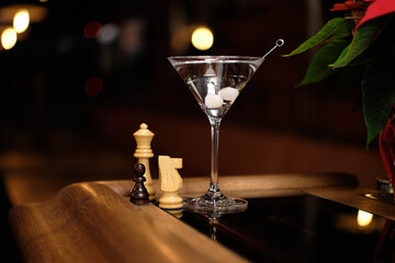 Martini gibson cocktail near chess Queen's Gambit