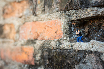 Miniature : photographer taking a photo of nature in the tropical forest.