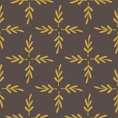 Botanic ornament seamless pattern with yellow leaves branches shapes. Brown background.