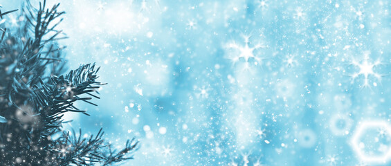 Fototapeta na wymiar Blue abstract winter background. Snowflakes and snow with bokeh effect.