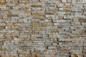 The stone wall texture background natural color. Background of stone wall texture photo. Natural stone wall texture for background. Old Brick  texture, Grunge brick wall background.