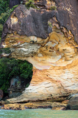 Geologically interesting sandstone rock formation at Bako National Park on Borneo. The park with its rich biodiversity and multiple biomes is also famous for his sea stack rocks