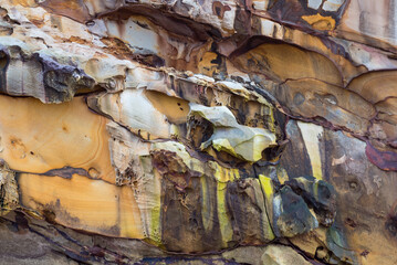 Geologically interesting sandstone rock formation at Bako National Park on Borneo. Caused by erosion exhibit colorful layers how it was formed