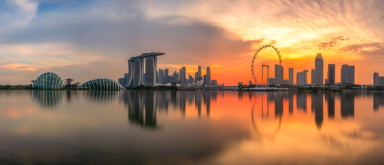 Obraz na płótnie Canvas Landscape of financial district and business building at sunset time in Singapore city