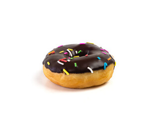 Chocolate flavoured donut with sprinkles on white background. One black doughnut isolated picture. Homemade bakery concept.