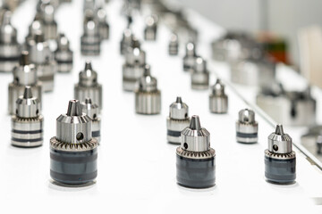 quick or fast key chuck for hold or lock drill bit portable hand tool machine in manufacturing in industrial on table