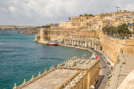 traveling the beautiful streets of Malta with old historical and new modern buildings