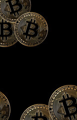bitcoin coins isolated on black background with copyspace