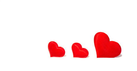 Three red hearts in the bottom right corner on a white background. 