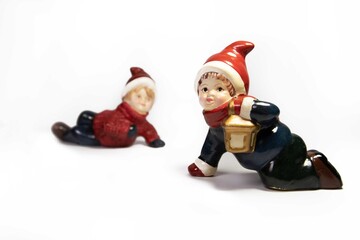 Two boy figurines Christmas decorations