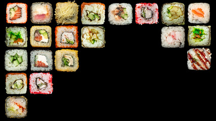 Set of seafood - isolated rolls on black background.