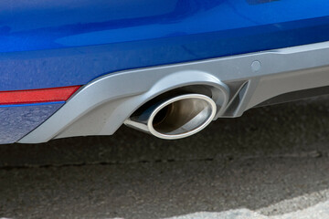 Obraz na płótnie Canvas Close-up an exhaust pipe of a car.